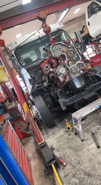 Diesel engine removal in progress